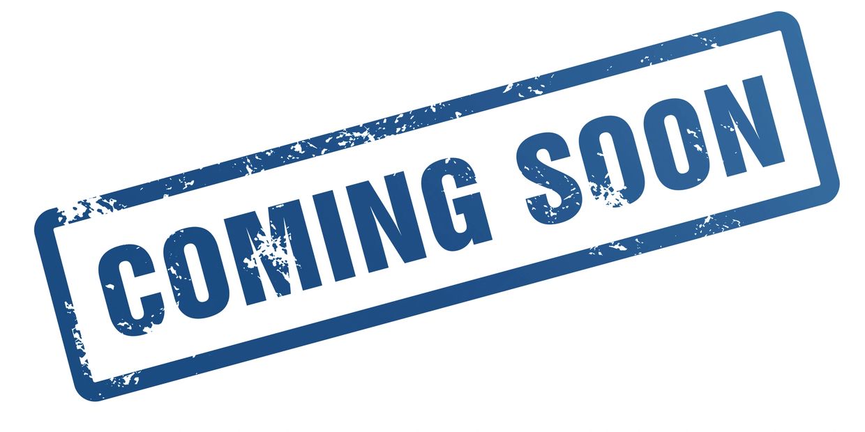 Blue stamped text reading 'COMING SOON' on white background.