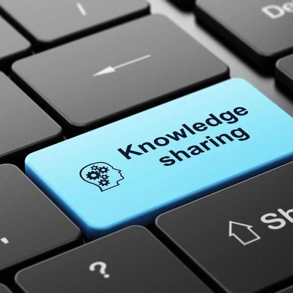 Blue keyboard key labeled 'Knowledge sharing' next to the Enter key.