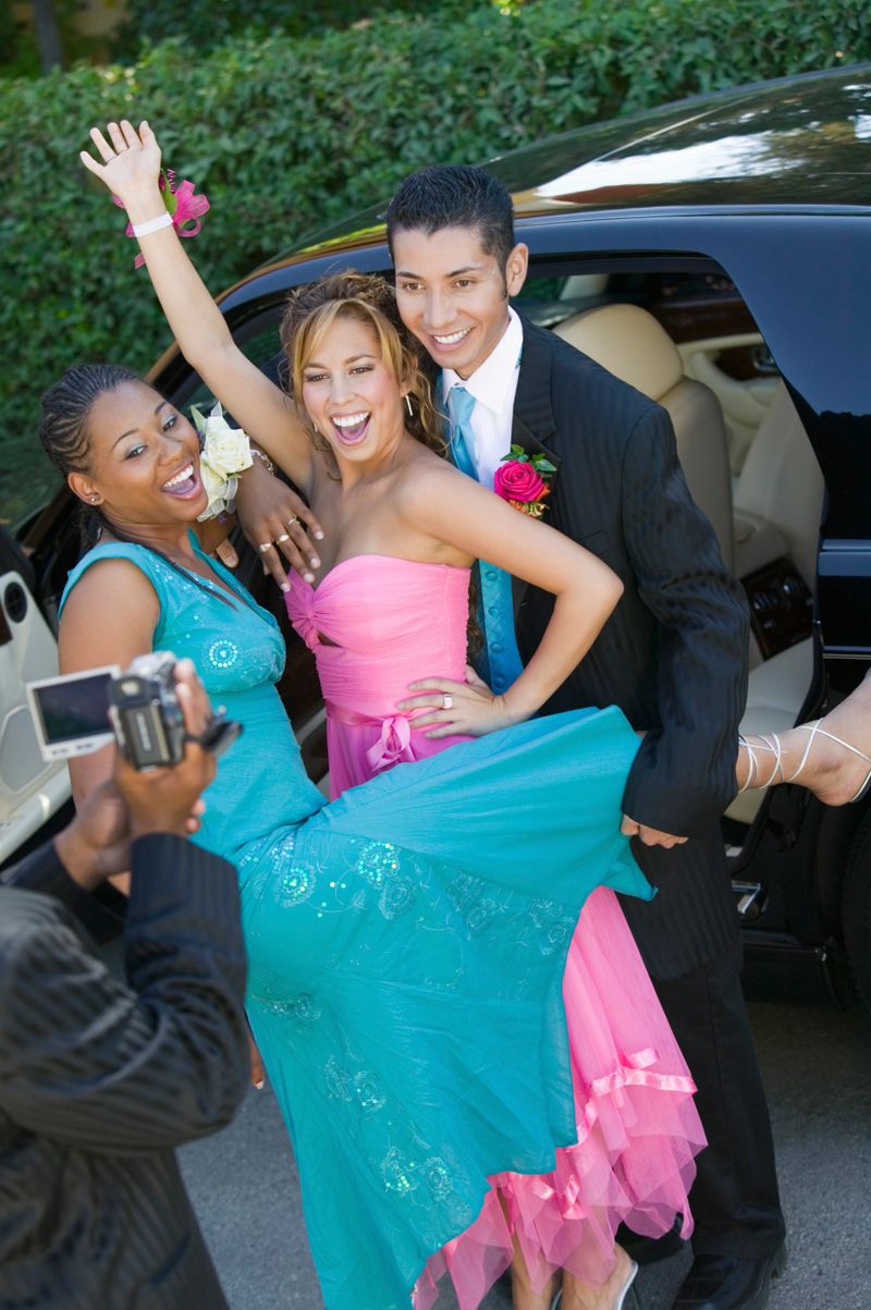 Teenagers Videotaping Their Prom