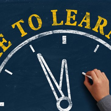 Hand drawing clock and phrase "Time to Learn."