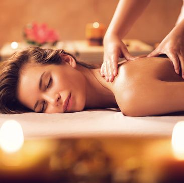 Person receiving hands-on healing or energy therapy while lying down.