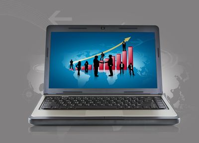 Gray laptop with blue screen background.