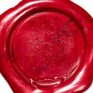 A red wax seal on a white background.