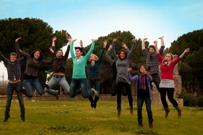 Students Jumping in a campus