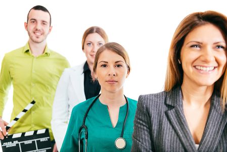 Group of professionals from diverse fields standing in a line.