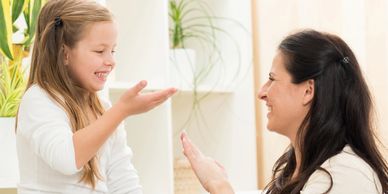 Counselor interacting with child 