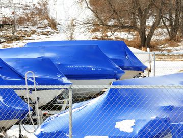 Boat storage, shrink wrap, winterization, boat and pontoon pickup and delivery, Jetski, tritoon