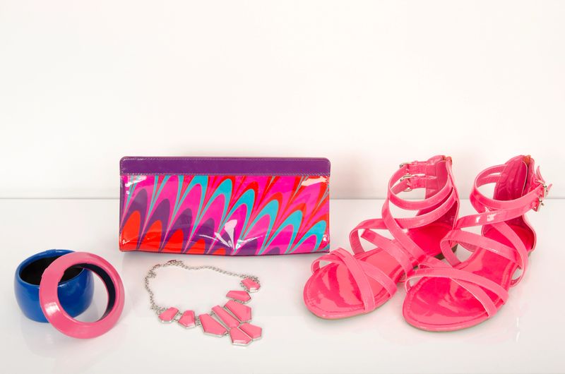 Summer pink sandals with bag and jewellery.