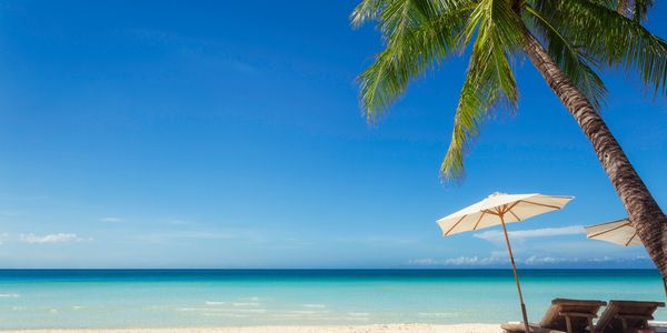A beachfront wedding setup is perfect for destination weddings and unforgettable romantic honeymoons.