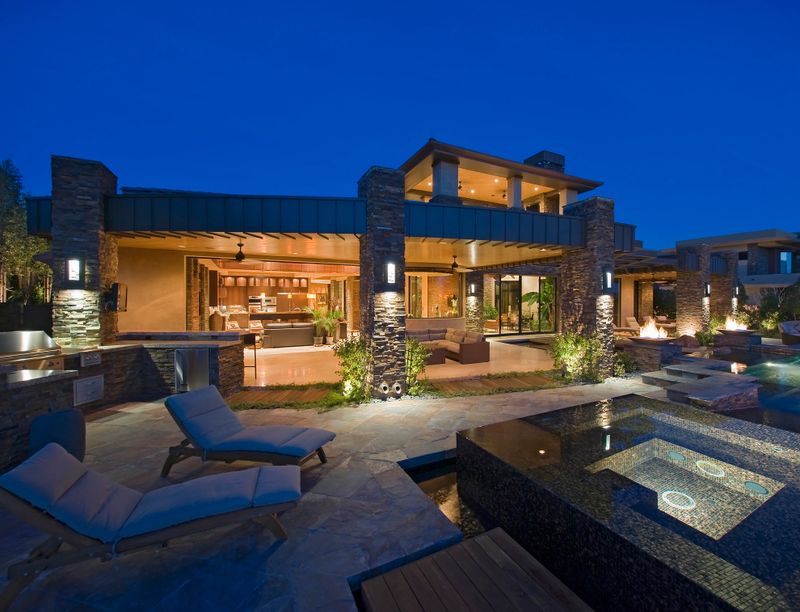 Exterior of contemporary house with plunge pool at dusk