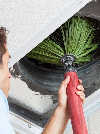 Duct cleaning in a home.