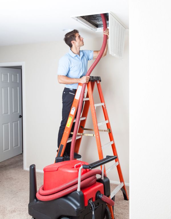Air duct cleaner using roto brush to clean air duct.