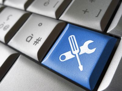 Blue keyboard key with wrench and screwdriver icon.