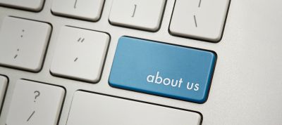 Keyboard with a blue 'about us' key.