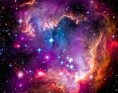 Colorful nebula with bright stars in space.