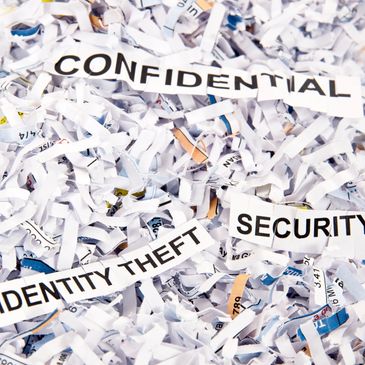 Shredded paper with security words.