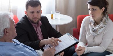 Group discussing health documents.