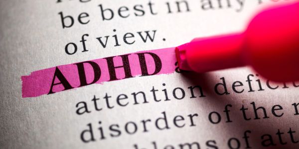 ADHD highlighted in pink on a page.