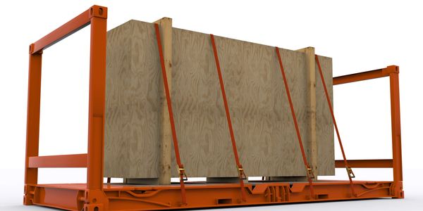 Large wooden crate secured with red straps on an orange metal frame.