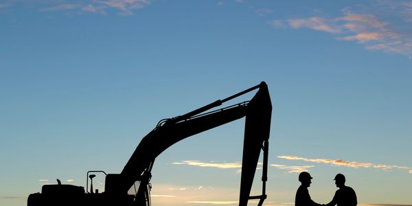 excavator at dusk
