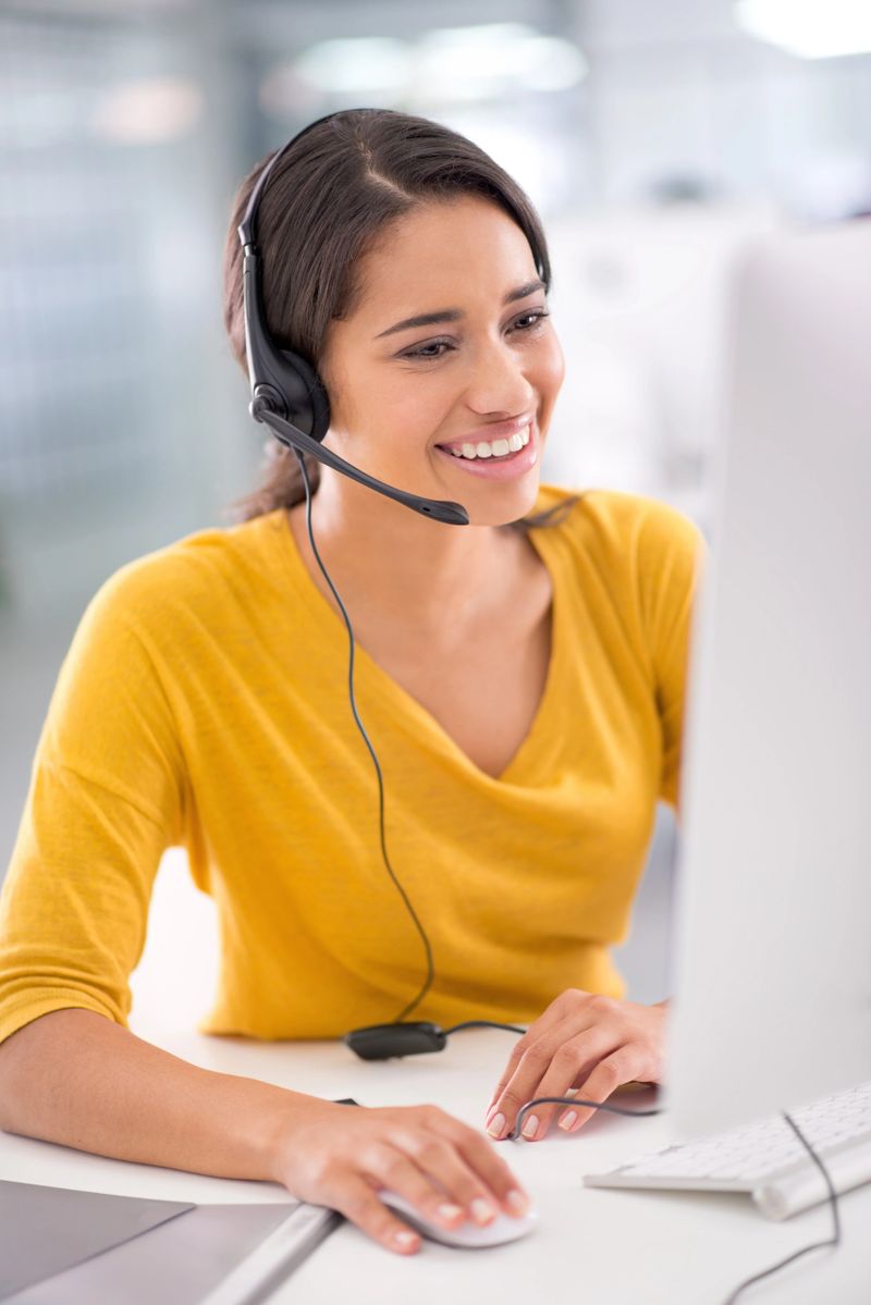 Shot of a young customer service representative wearing a headset while sitting by her computerhttp://195.154.178.81/DATA/i_collage/pi/shoots/783265.jpg