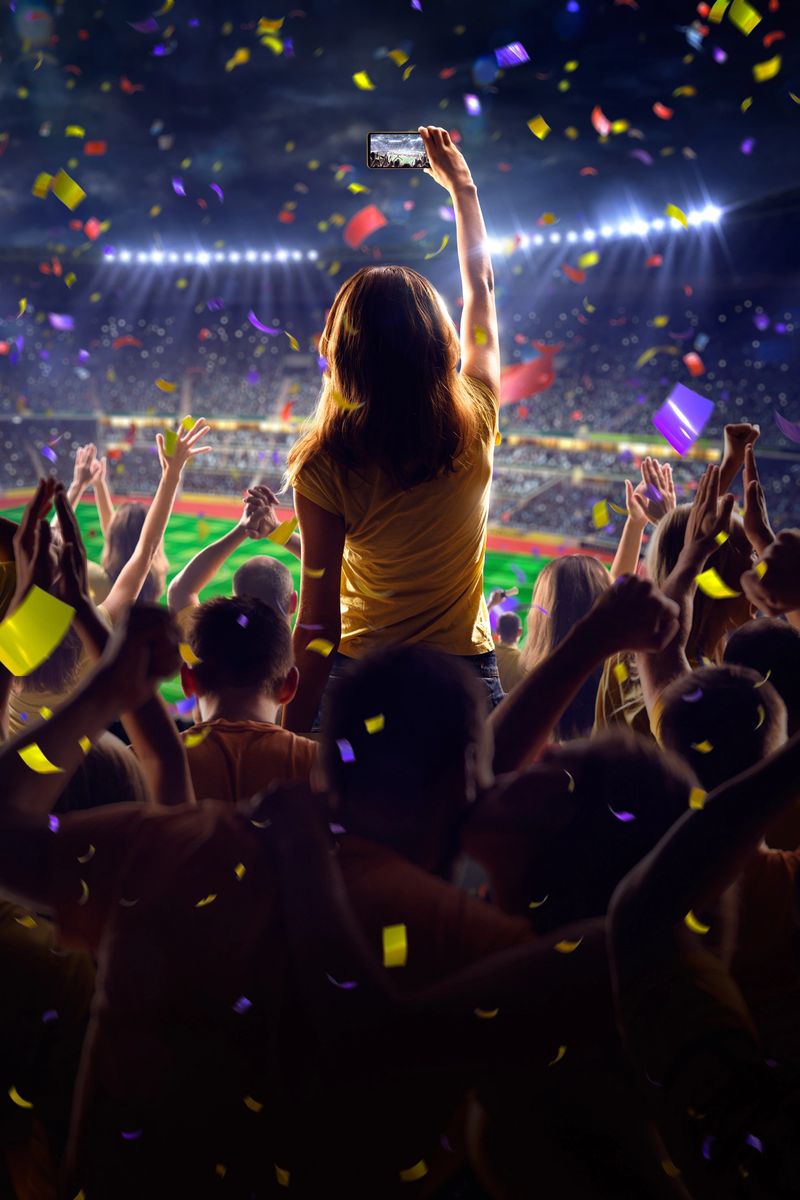 Fans on stadium soccer game Confetti and tinsel