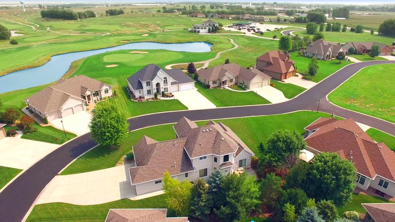 New affluent neighborhood next to golf course.