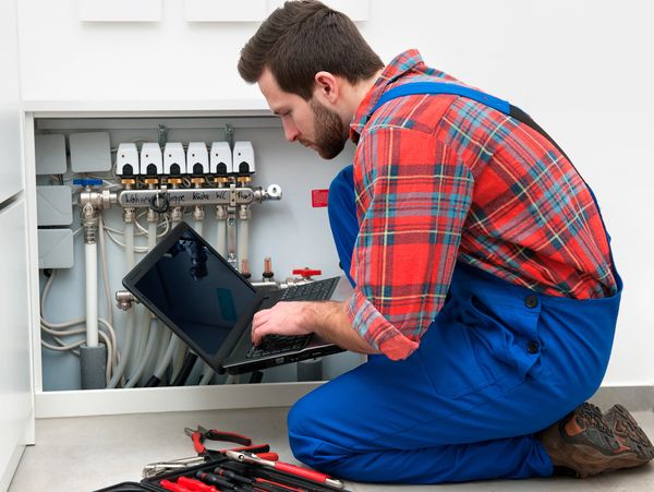 Technician working on furnace