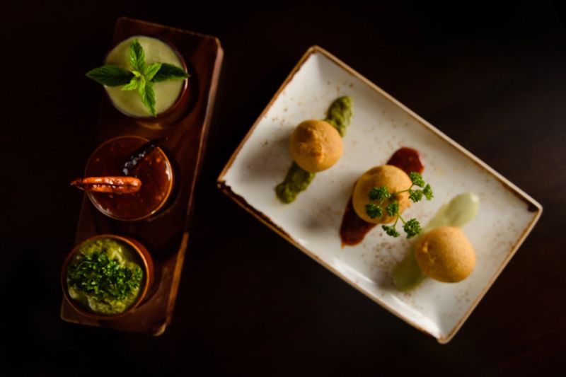 Plated and served indian food.