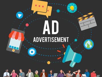 Diverse group using devices below digital advertisement icons and text.