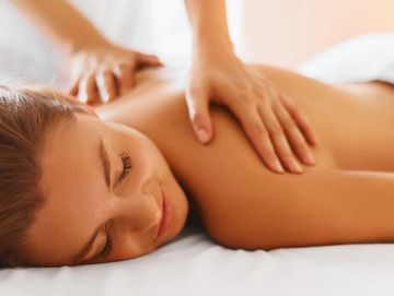 Woman getting back massage