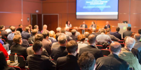 Audience attending a conference or seminar.