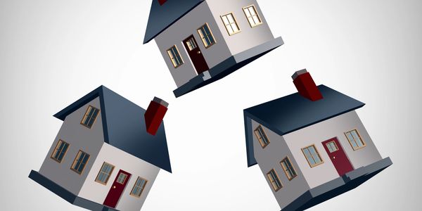 Three house images shown in an album