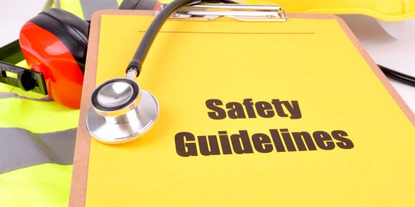 Clipboard with Safety Guidelines and stethoscope.