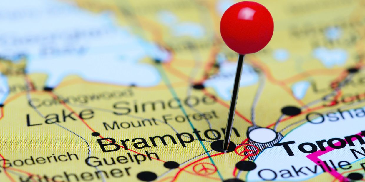 Red pin marking Brampton on a map near Toronto, Canada.