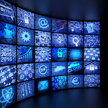 Curved digital display wall showcasing various blue technology and business icons.