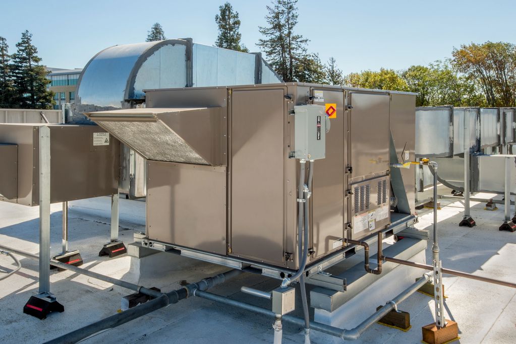 Installation, réparation et entretien de climatiseurs rooftop fiables pour commerces et industries