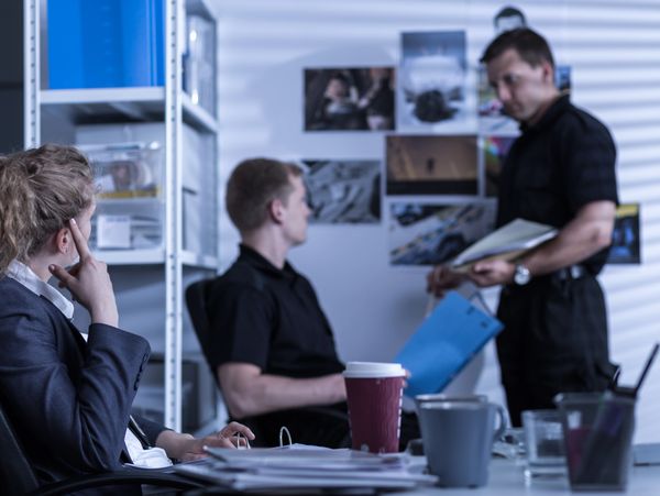 image shows Beacon Investigative Services in Greenville SC meeting about background checks