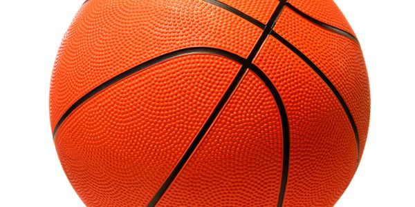 Close-up of an orange basketball showing its textured surface and black lines.