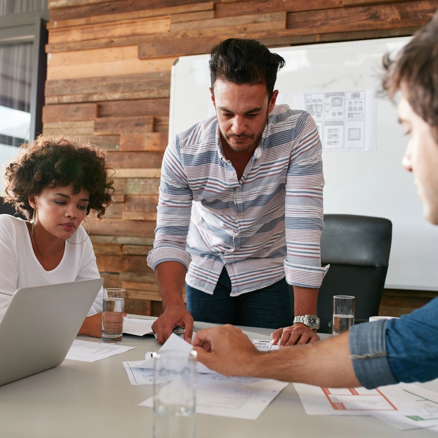 Group of young professionals collaborating on a project.
