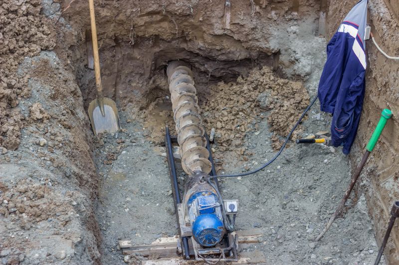 boring tool and drilling under street for sewer pipes