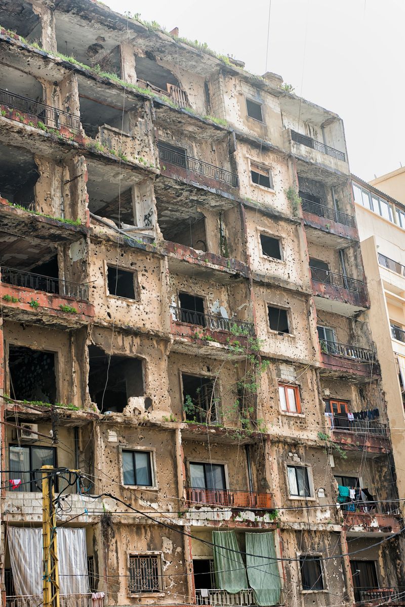 War damage. Building full of bullet holes and war scars in Beirut, Lebanon.