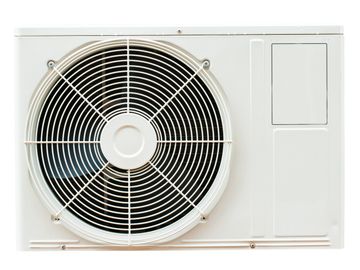 White outdoor air conditioning unit with fan grille.
