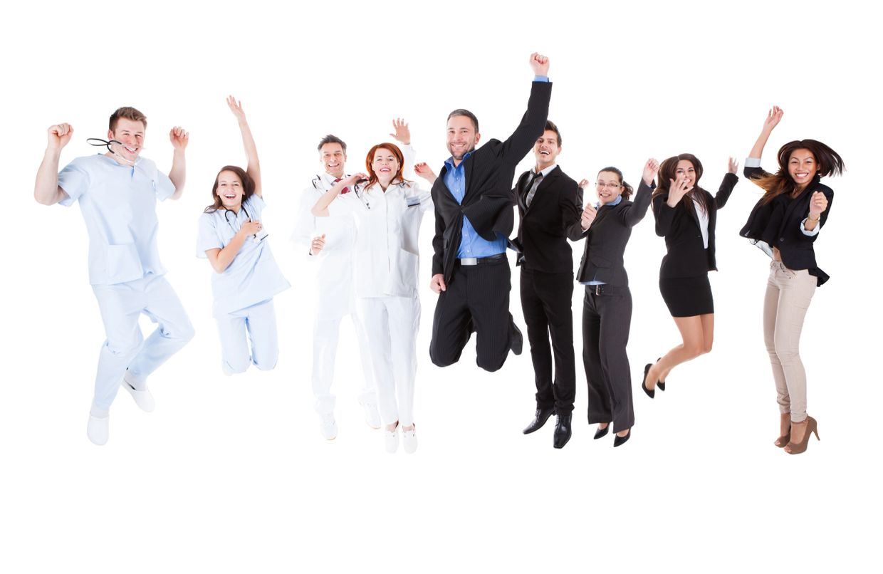 Healthcare providers and their patients jumping for joy.