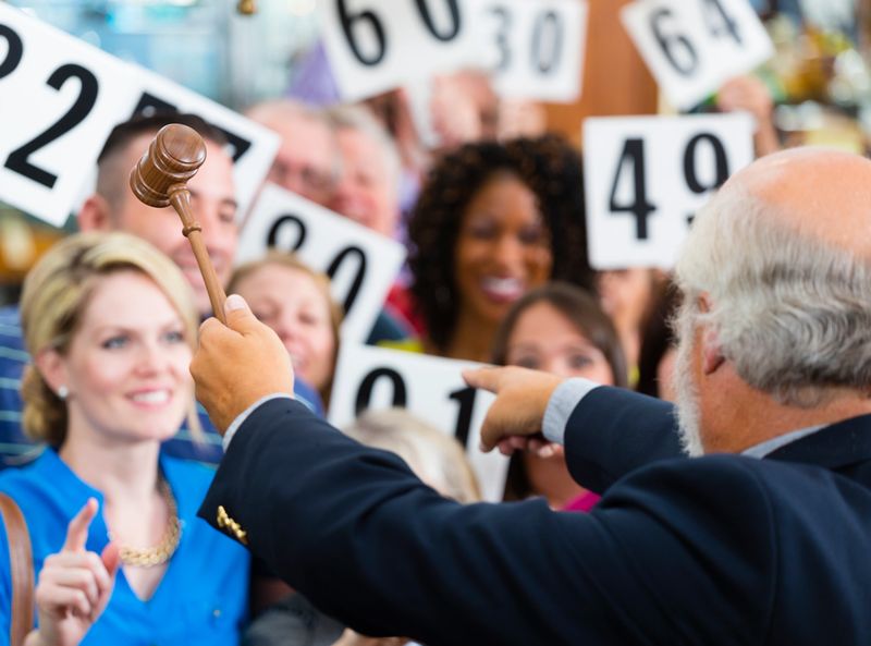 A crowd of bidders at an auction.