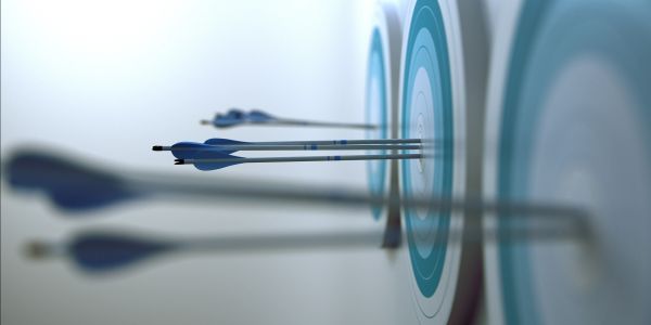 Arrows hitting blue bullseye targets.