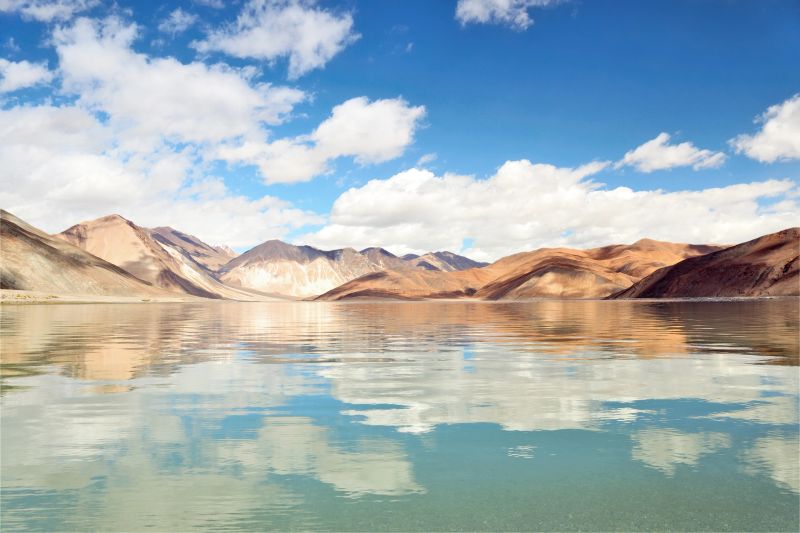 Pangong Tso (also known as Pangong Lake) is an endorheic lake in the Himalayas situated at a height of about 4,350 m. It is 134 km long and extends from India to Tibet. Approximately 60% of the length of the lake lies in Tibet. The lake is 5 km wide at its broadest point. All together it covers 604 km2.