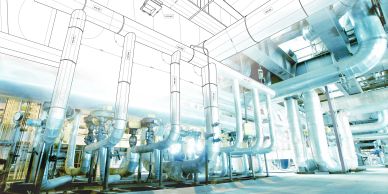 Industrial pipes and ducts in a bright facility interior.