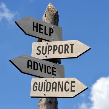 Wooden signpost with directions for help, support, advice, and guidance.