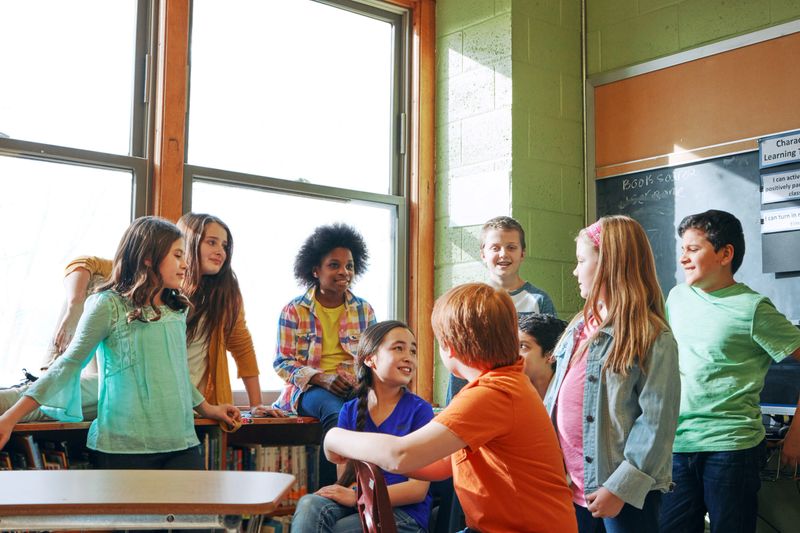 Shot of a group of elementary school children sitting in a classroom